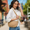 Eco-friendly woven crossbody bag made from recycled materials, featuring an adjustable strap and secure zipper compartments for hands-free convenience.
