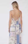 Back of a Bohemian floral patchwork maxi dress with adjustable spaghetti straps, a V-neckline, and two front slits. Lightweight and perfect for summer.