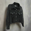 Black cropped western suede jacket with rhinestone-studded shoulders, flap pockets, and fringe detail along the sleeves.