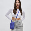 A stylish woven neoprene crossbody bag in a vibrant blue shade, featuring a compact design with multiple zippered compartments and an adjustable strap.