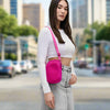 A stylish woven neoprene crossbody bag in a vibrant periwinkel shade, featuring a compact design with multiple zippered compartments and an adjustable strap.