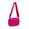 A sleek fuchsia woven neoprene crossbody bag with an adjustable strap, styled for a casual yet chic look.

