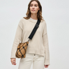 A black woven neoprene shoulder strap with adjustable length and metal clasps, designed to upgrade handbags or crossbody bags